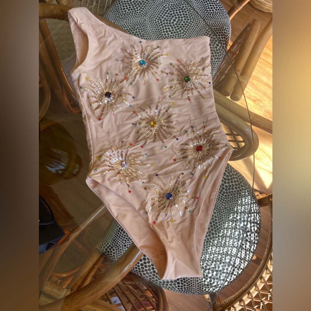 NWOT brand new Oceanus Callie one piece swimsuit. Color NUDE (very rare) XS